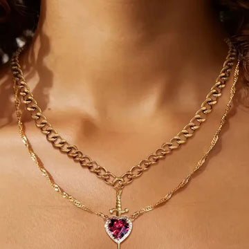 Guardian necklace; heart and sword